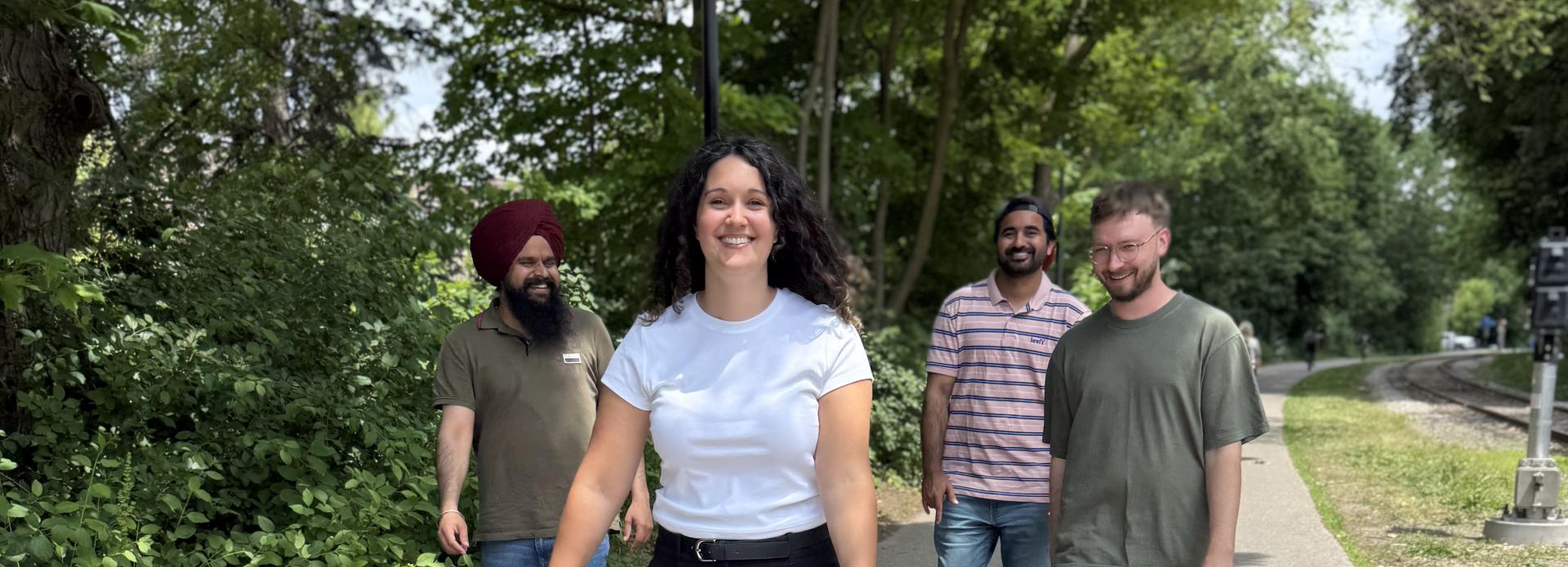 Upanup team members walking through a park