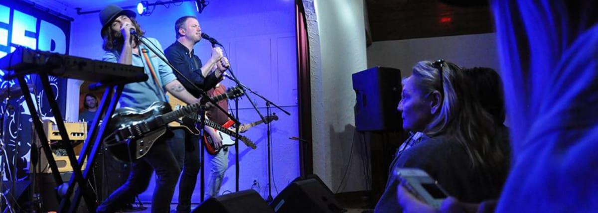 Woman in front row of concert